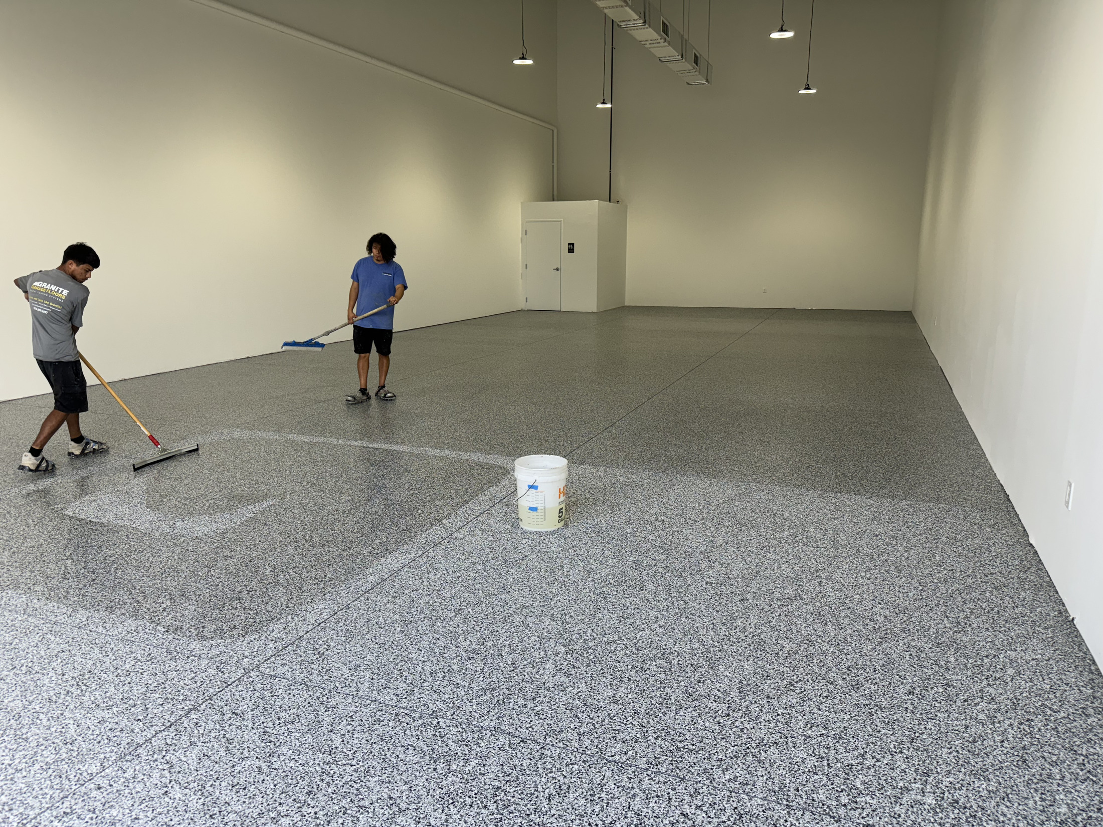 Commercial warehouse floor during coating installation